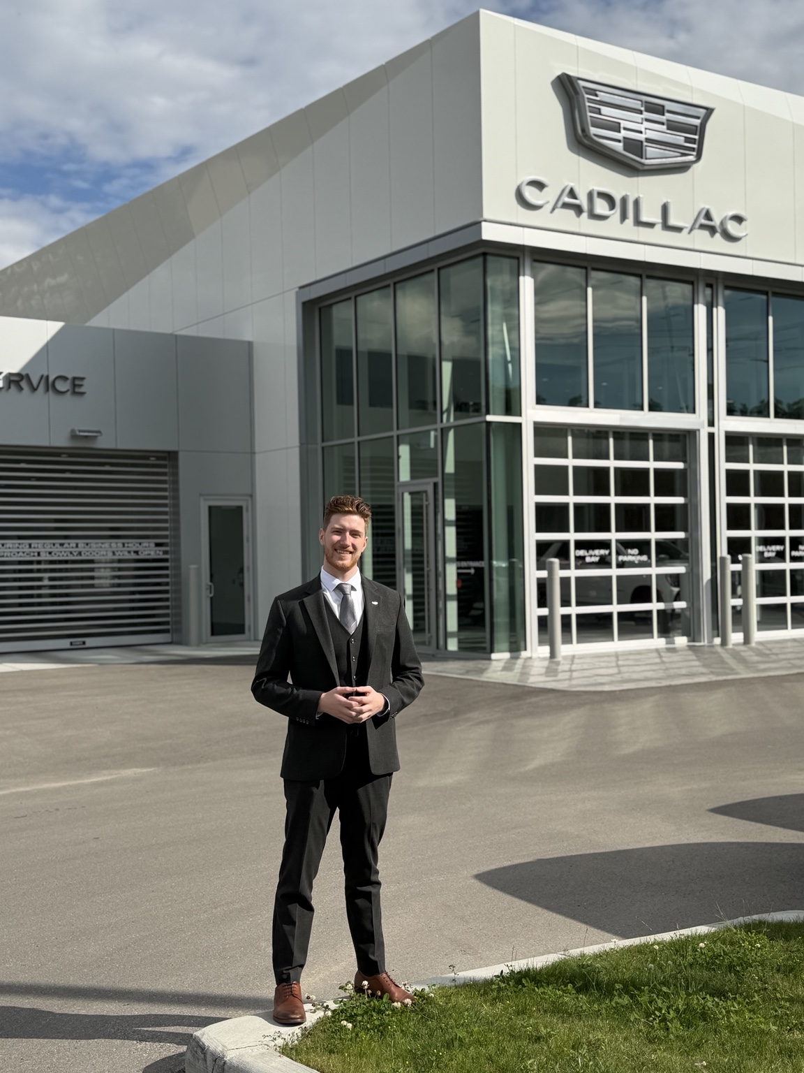 David Waddell outside Wolfe Cadillac Calgary